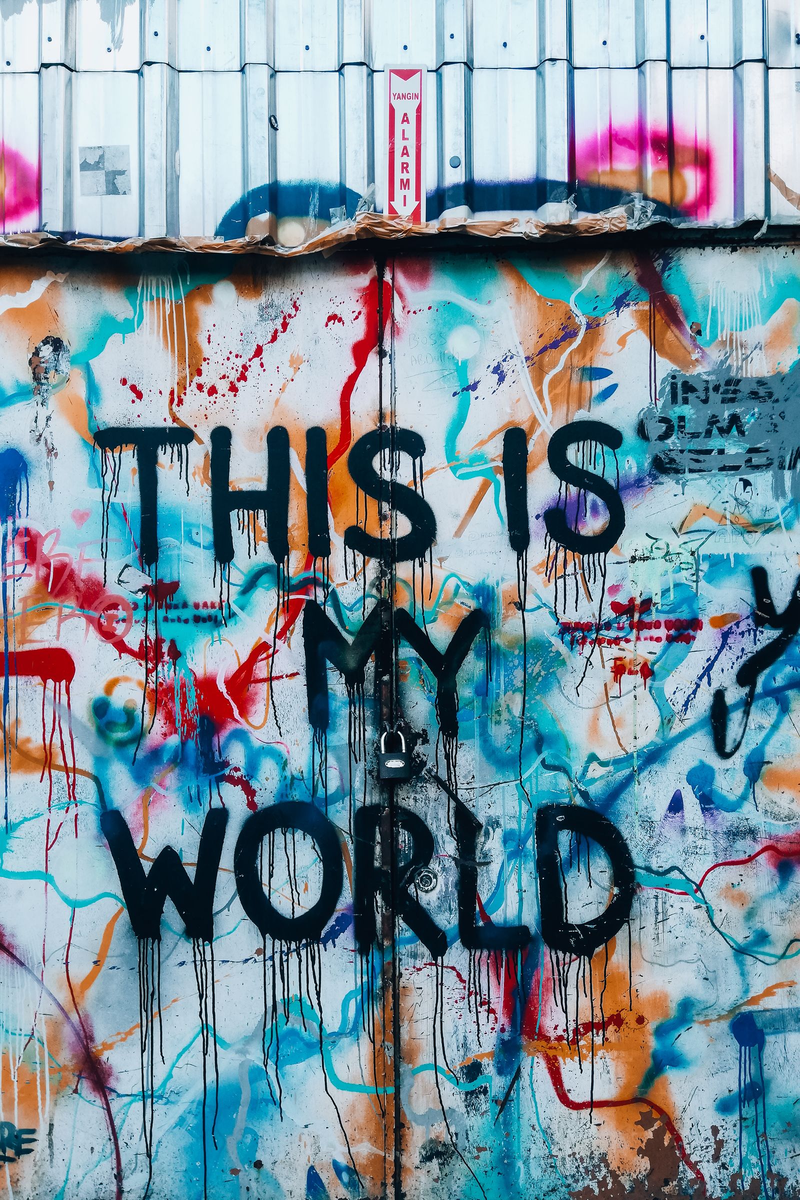 Bold urban graffiti mural with large lettering